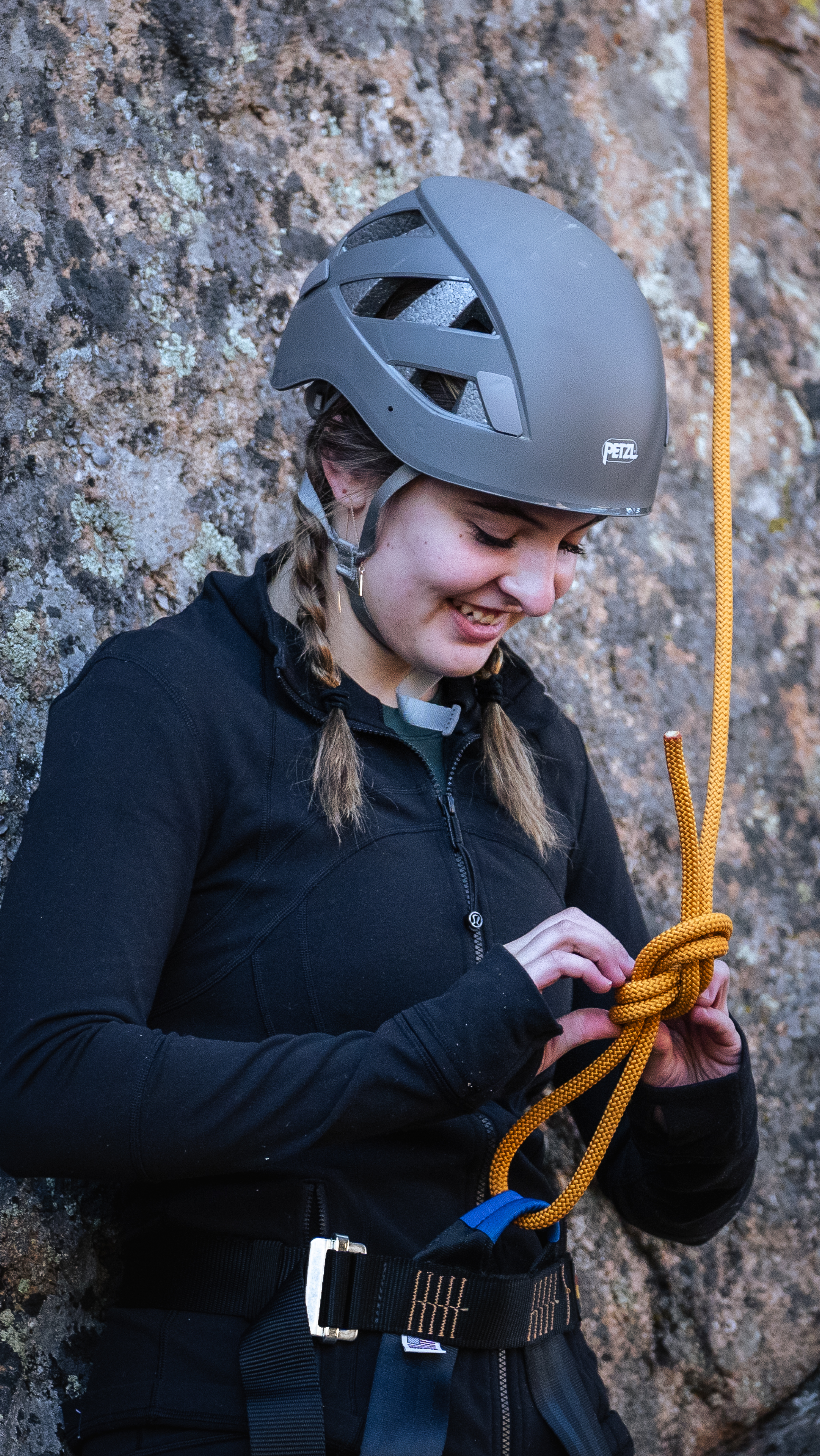 Student preparing rock climbing gear