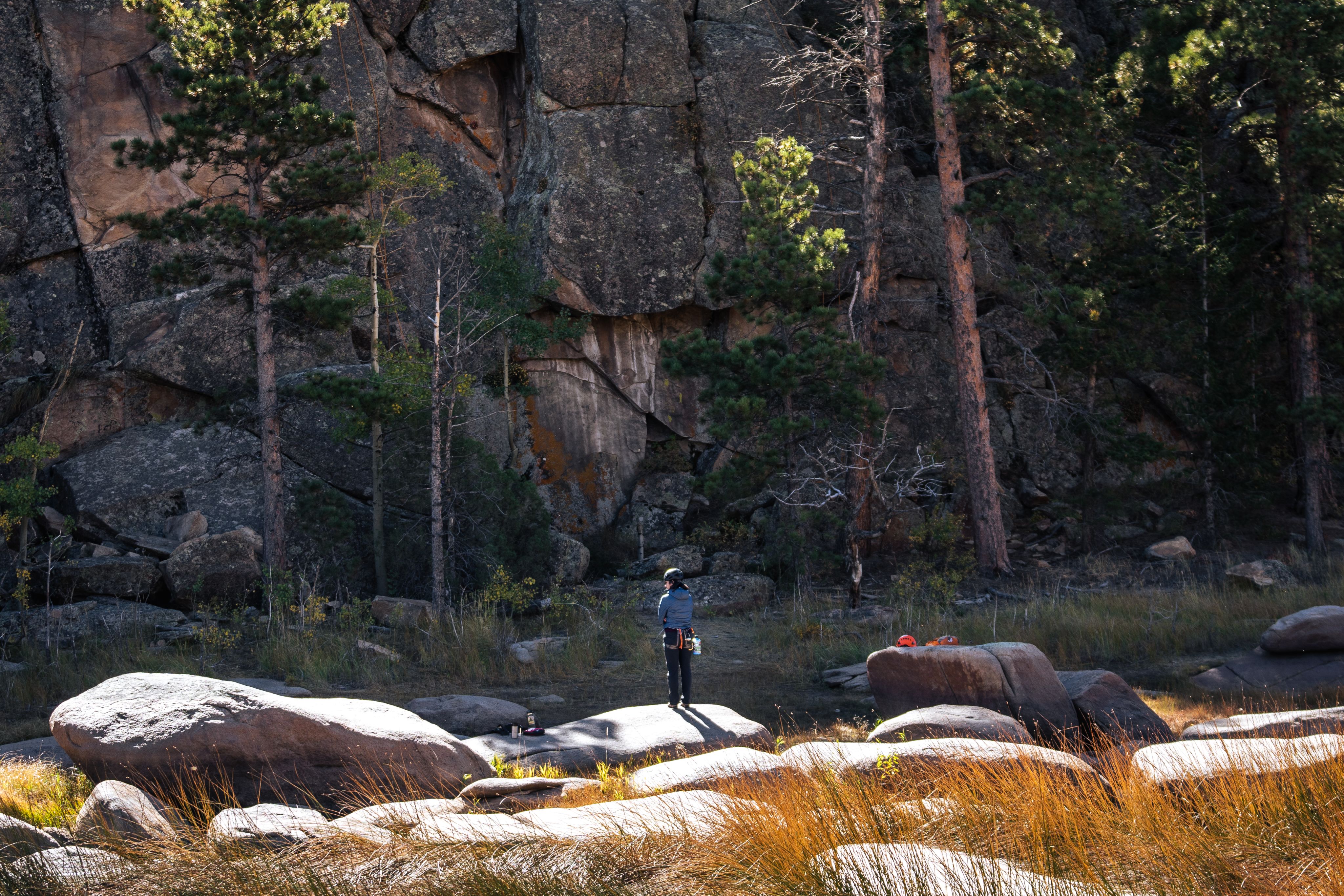 Student standing by a lake at Kennedy Mountain Campus