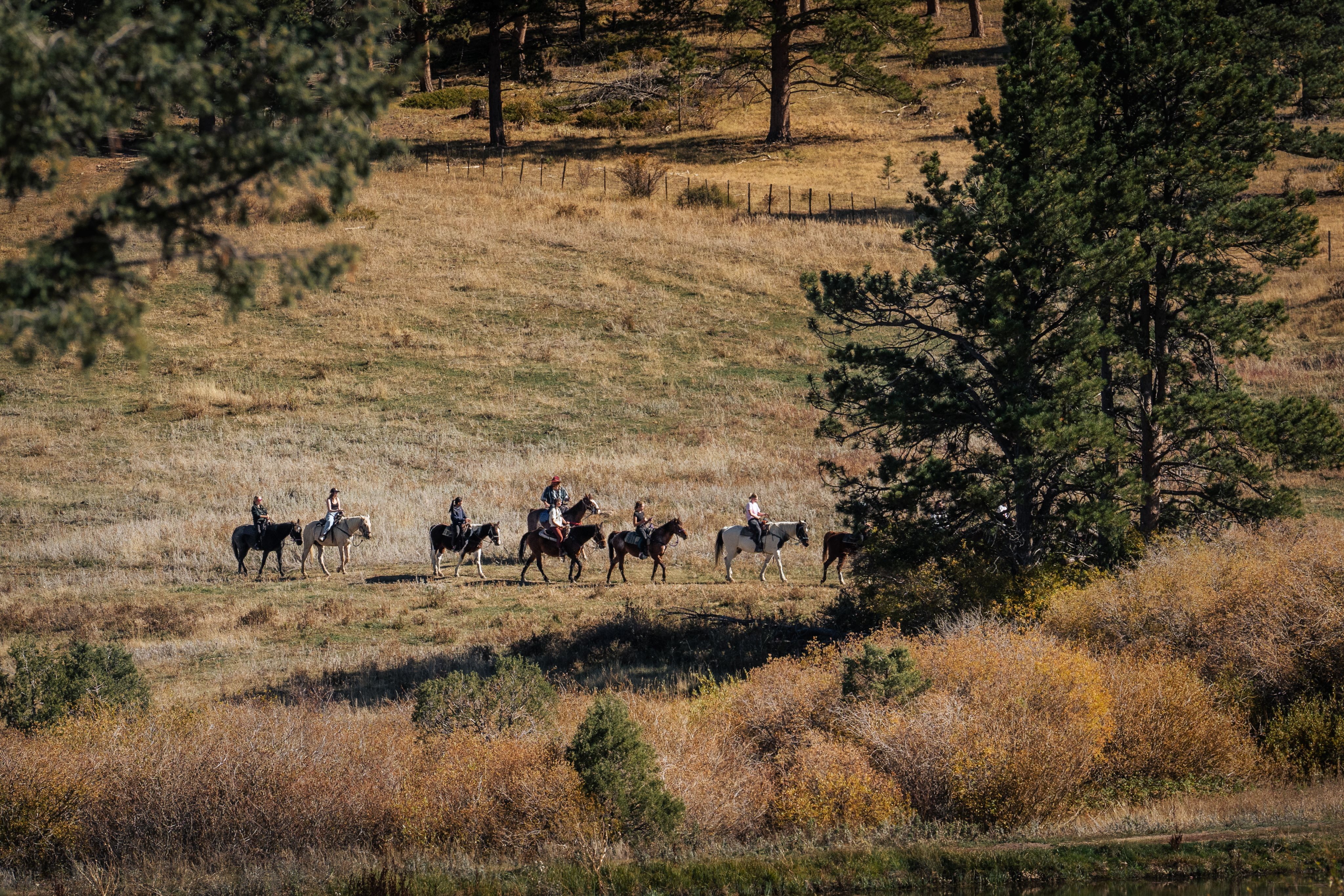 Students horseback riding at Kennedy Mountain Campus