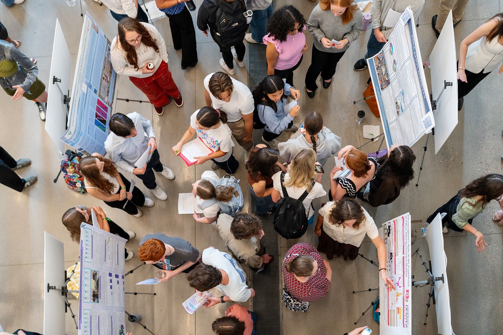 Overhead shot of students at the Signature Work Showcase