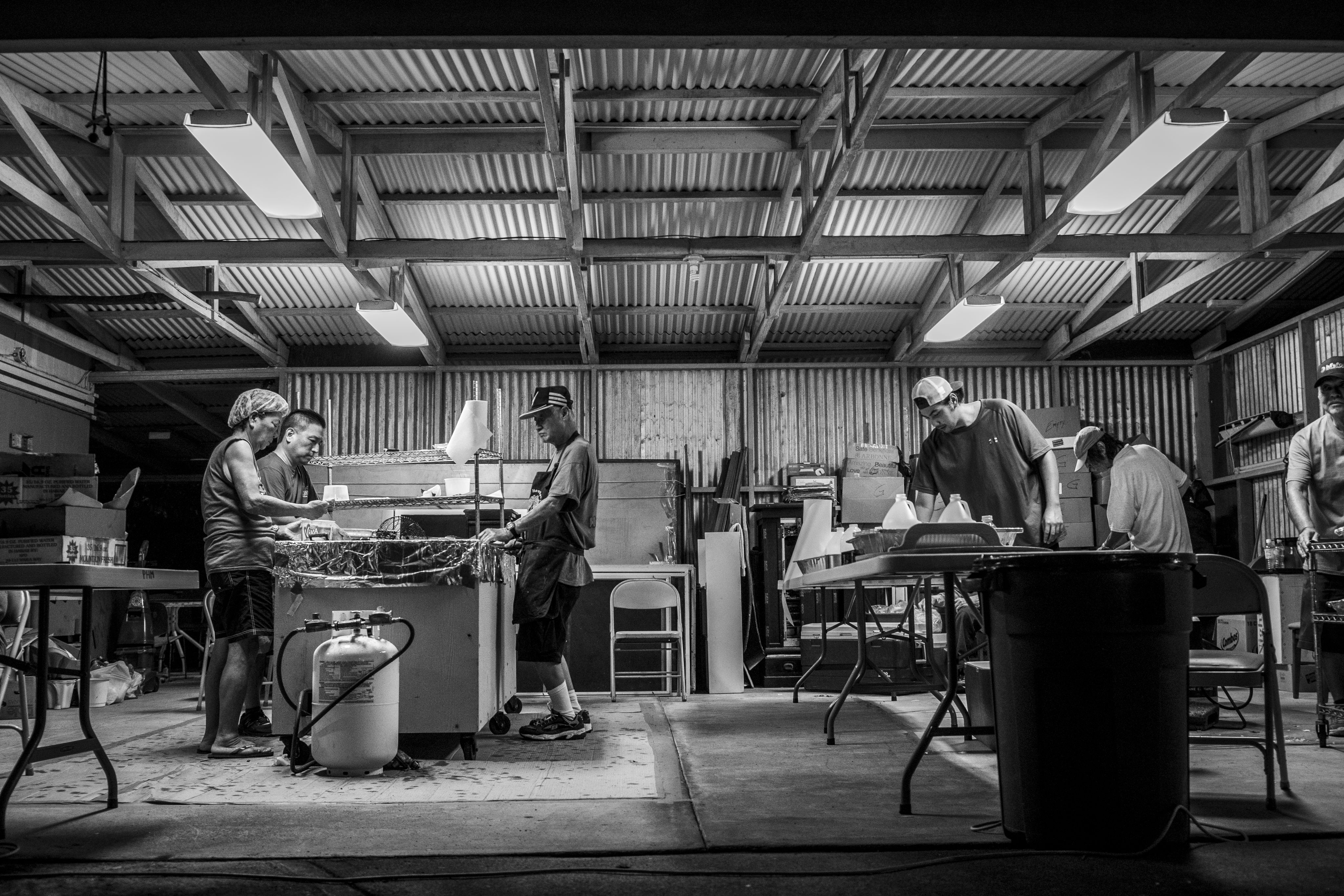 Workers inside of a warehouse.
