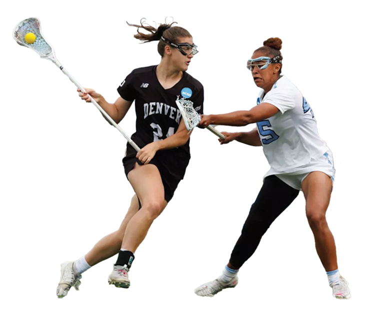 A lacrosse player carries the ball ahead of a defender. 