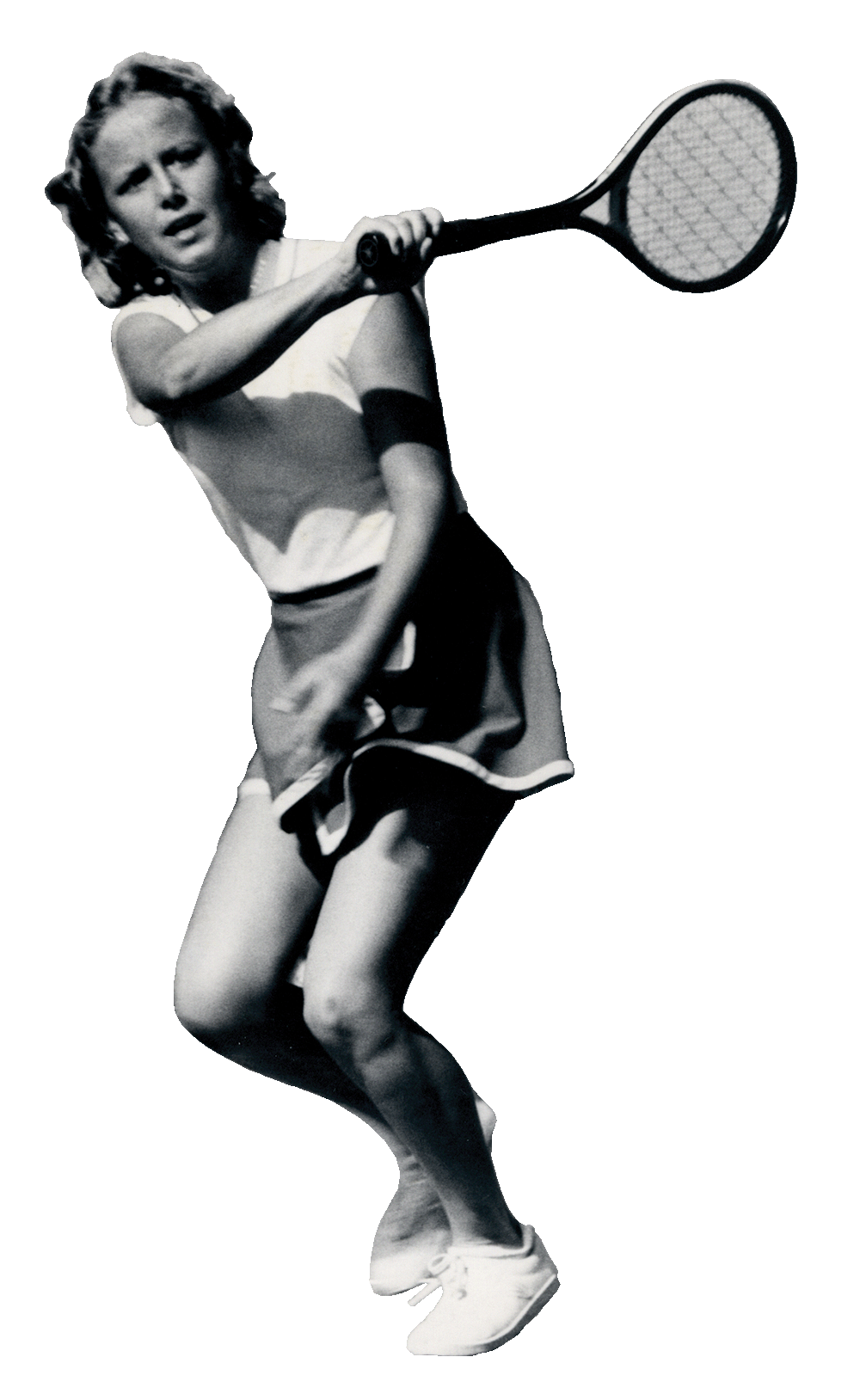 A tennis player swings for a ball. 