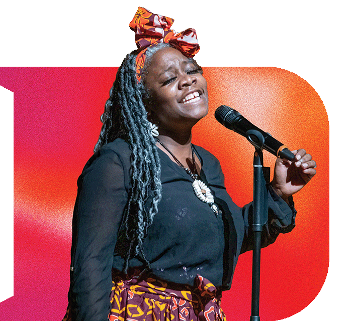 A student in a black shirt sings into a microphone, within a "D" shaped frame with an orange and pink gradient.