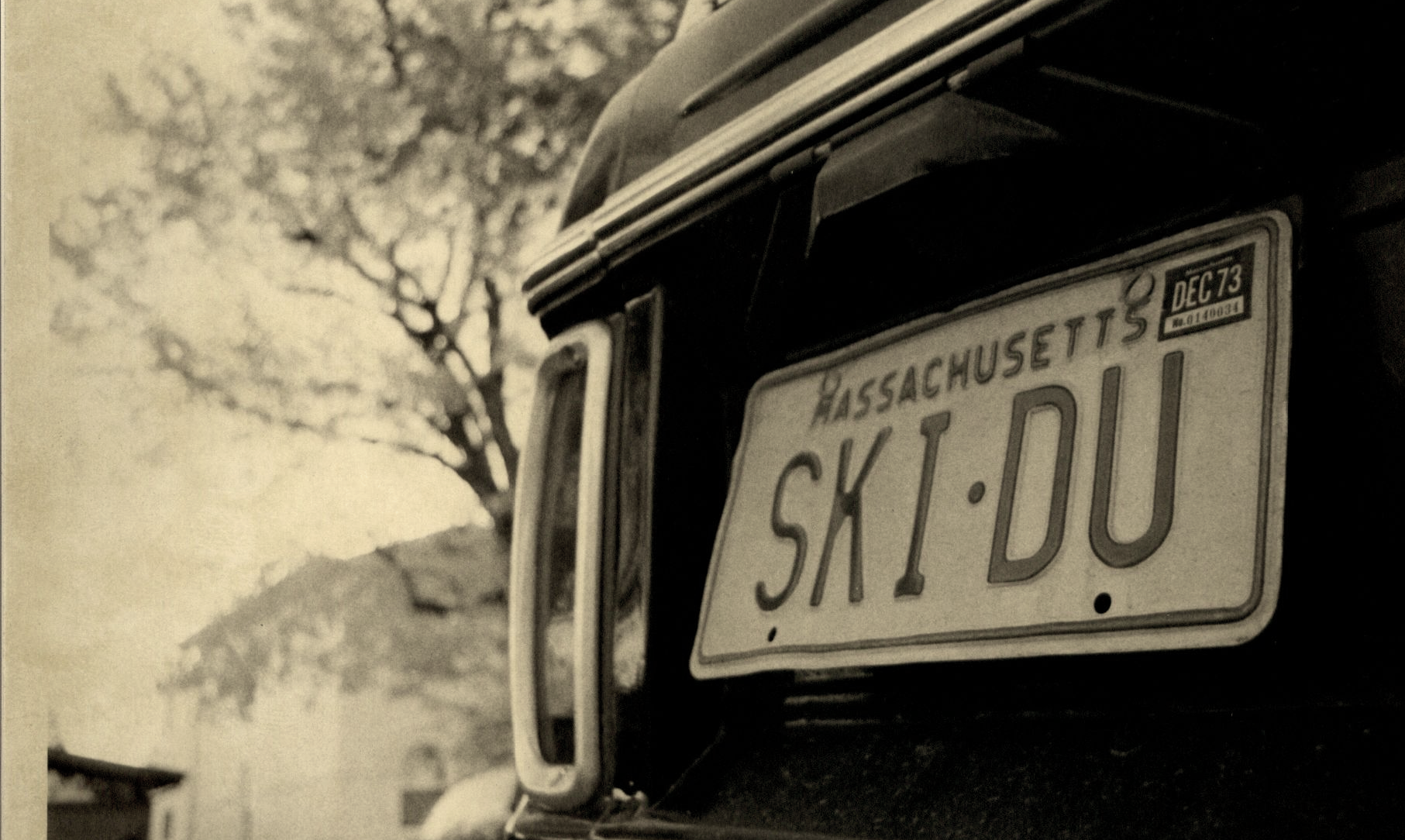 A Massachusetts license plate with the letters "SKI-DU" 