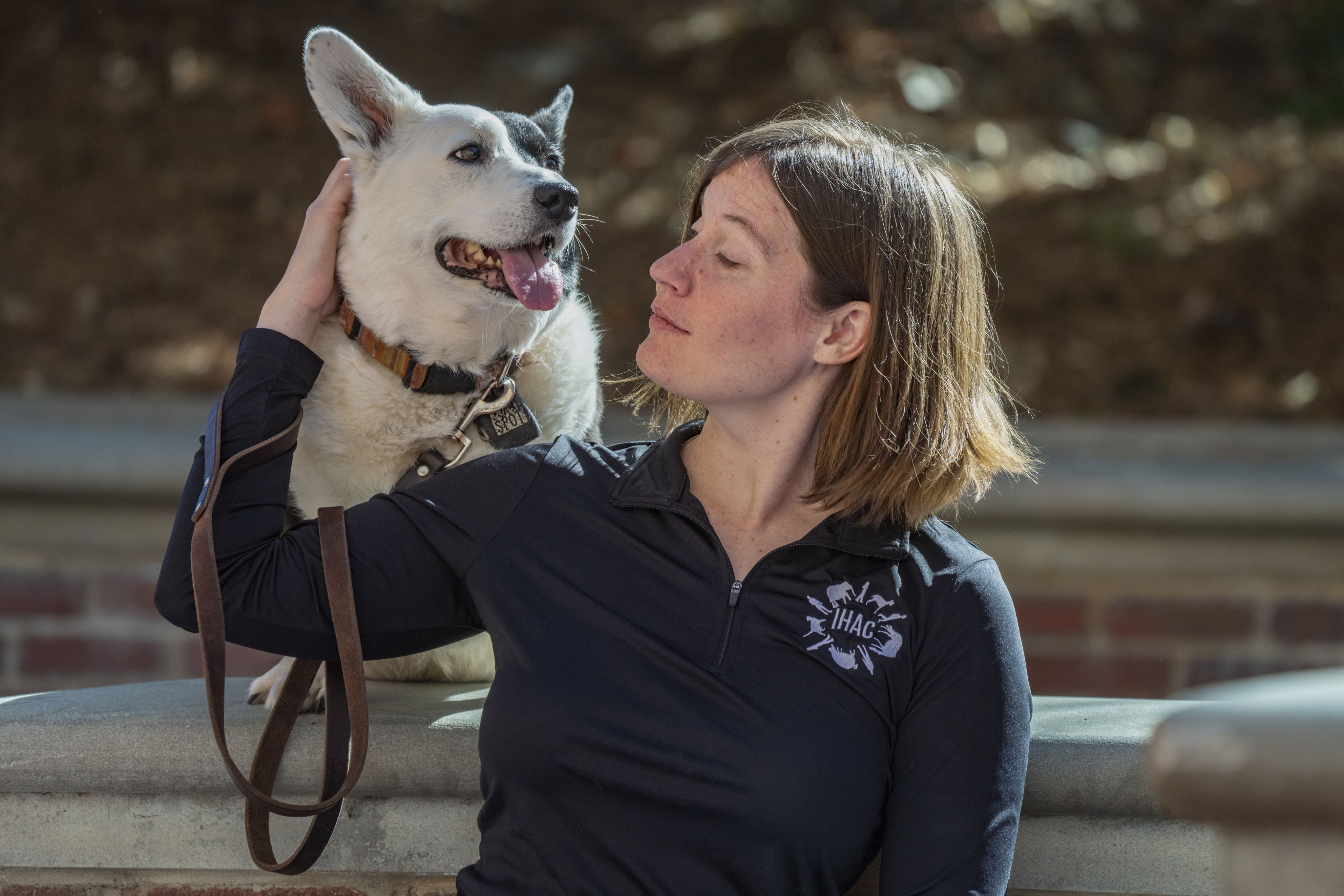 IHAC research associate Jaci Gandenberger enjoys time with her four-legged friend.
