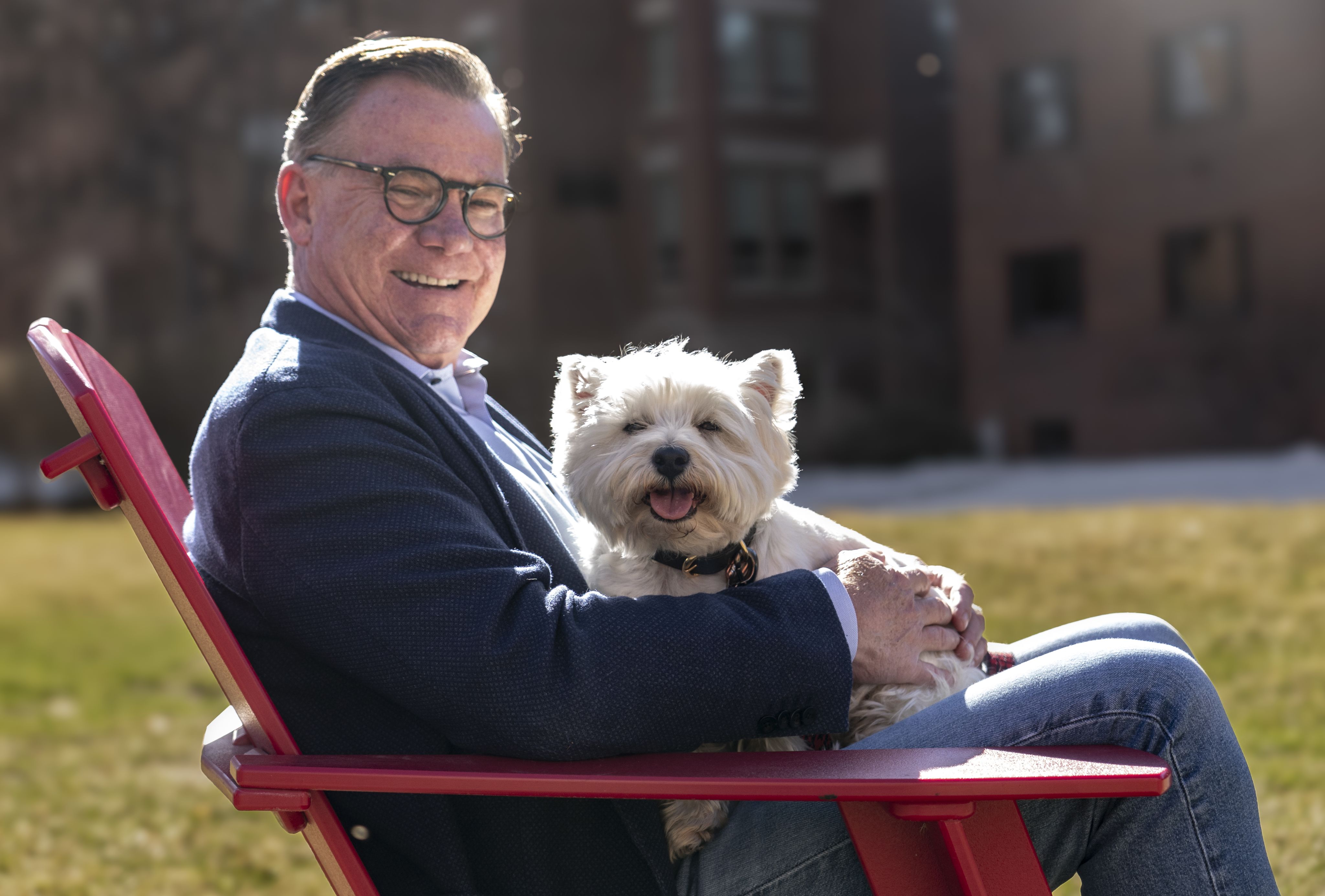 Kevin Morris, executive director of IHAC, shares a moment with his own loyal companion.