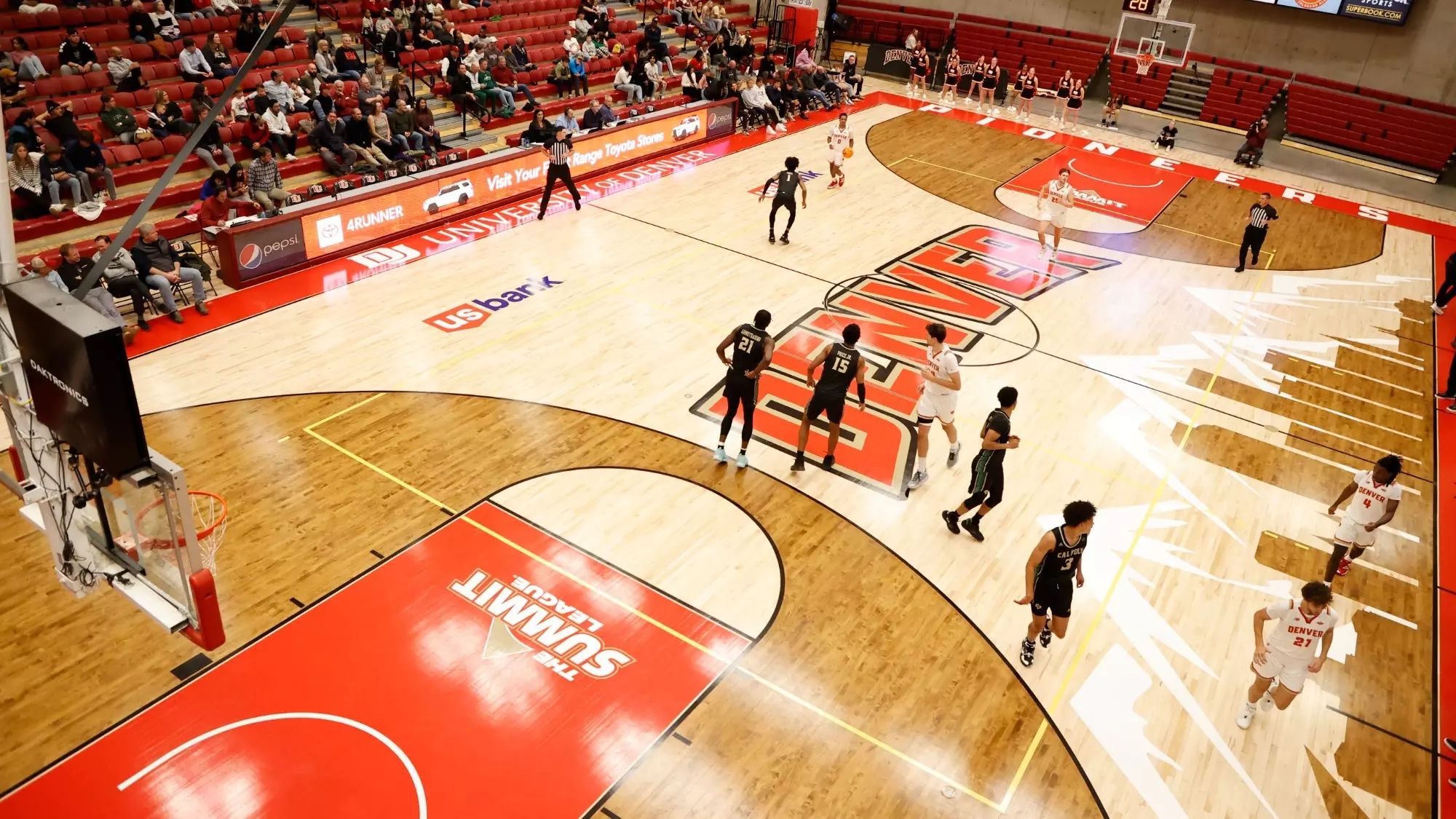 A photo of a basketball game in Hamilton Gymnasium, taken from a high angle