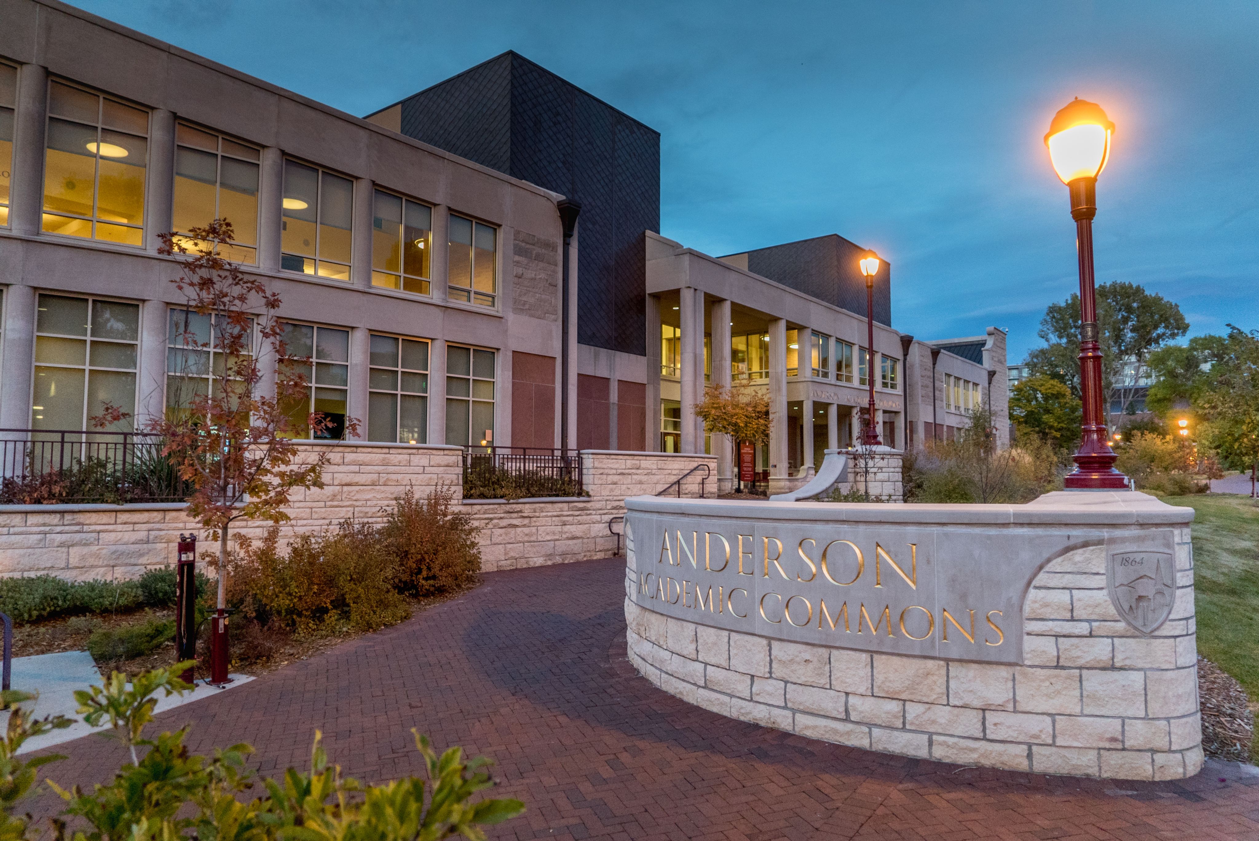 Exterior of Anderson Academic Commons around sunset