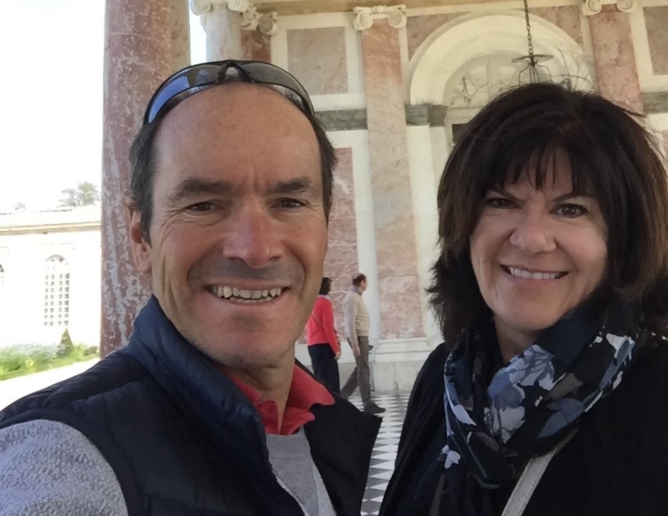 Ignacio takes a selfie of him and Tina in a coliseum-like building