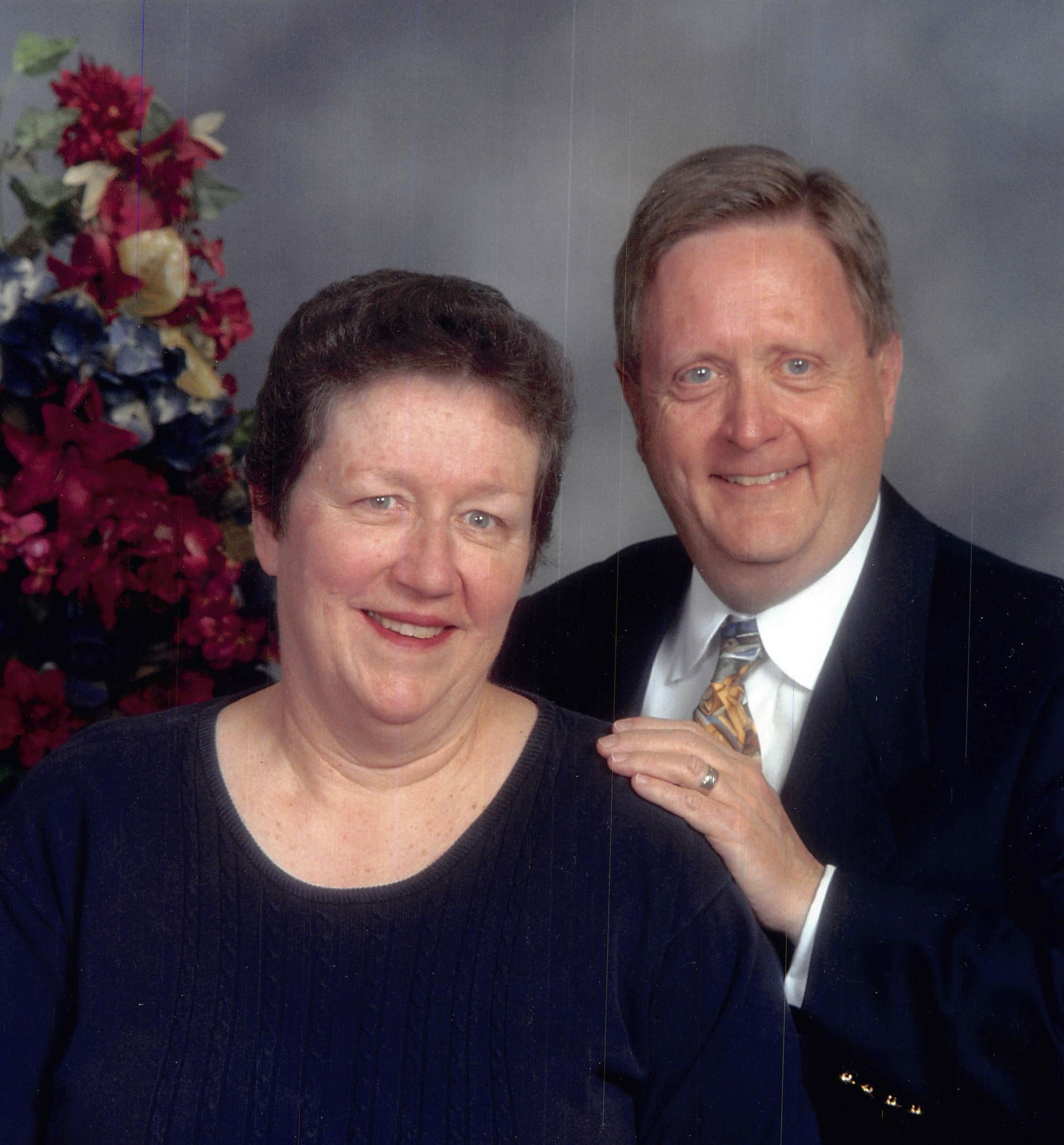 The Mcbride's pose for a formal photograph.