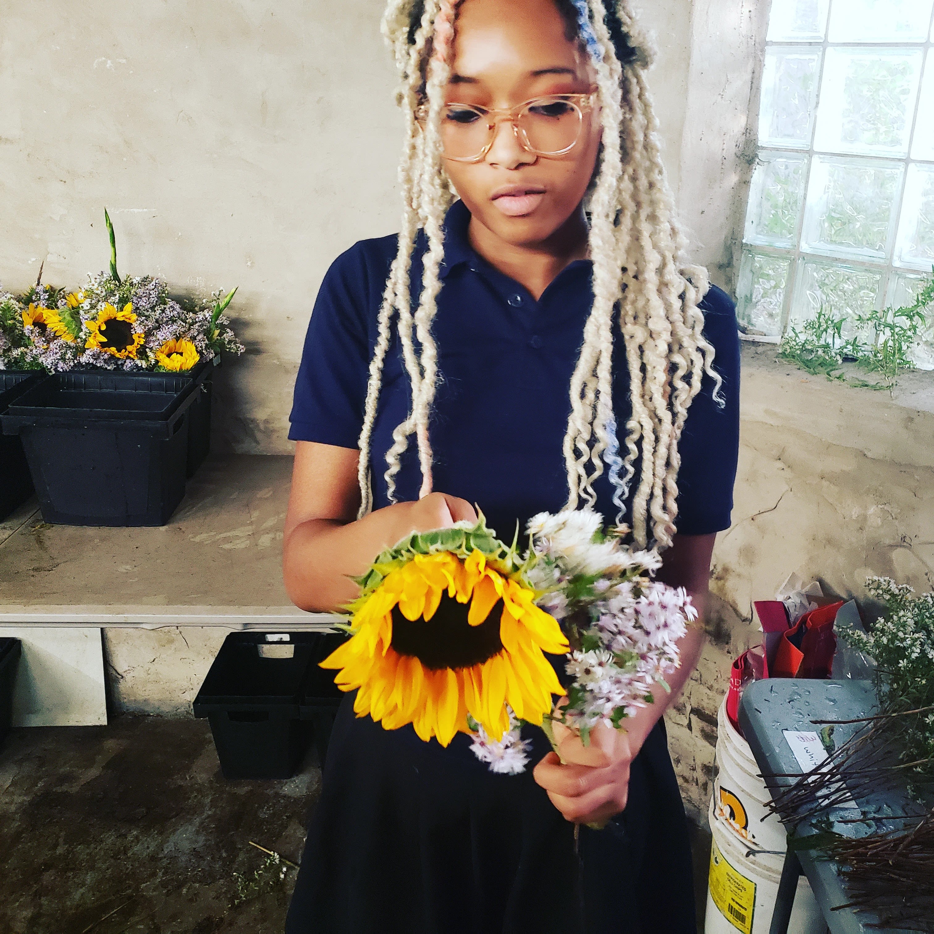 A woman arranging flowers