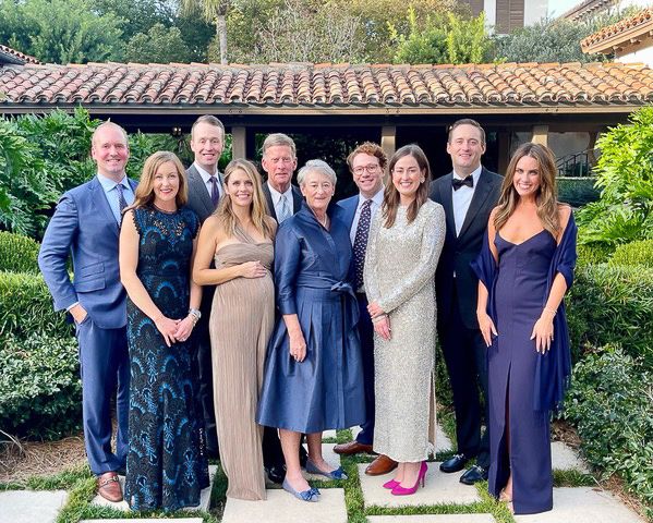 The Naughton-Nicholson family posing for a photo with Tom and Ann Naughton in the Center.