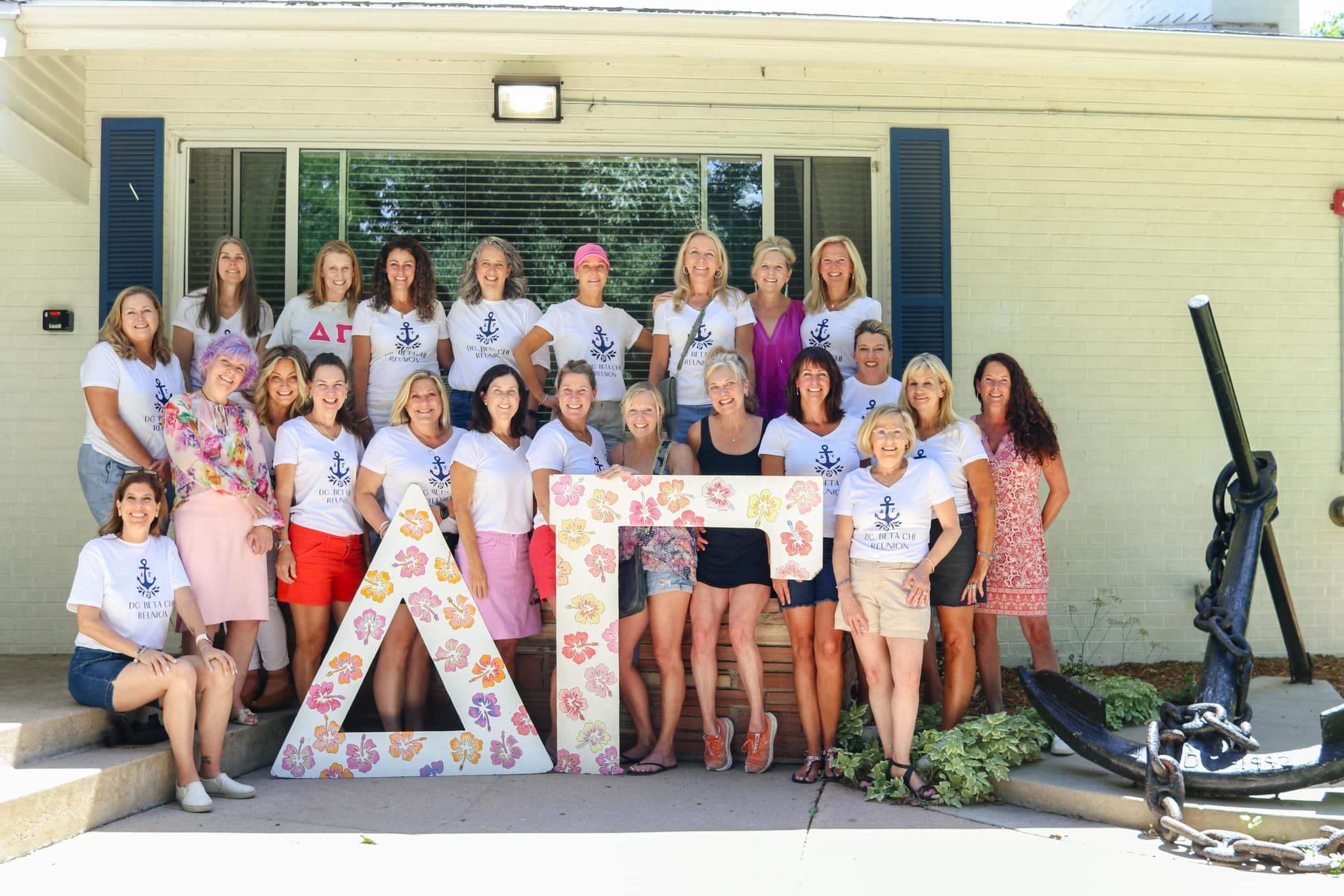 Alumnae from the Delta Gamma Sorority posing for a group photo.