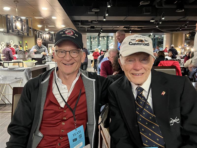 Chancellor Haefner with Chancellor Ritchie at a DU hockey game