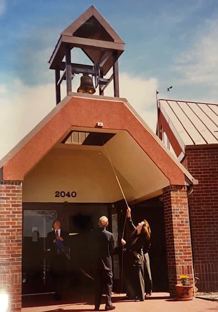 Dan Ritchie rings the bell at the Ricks Center