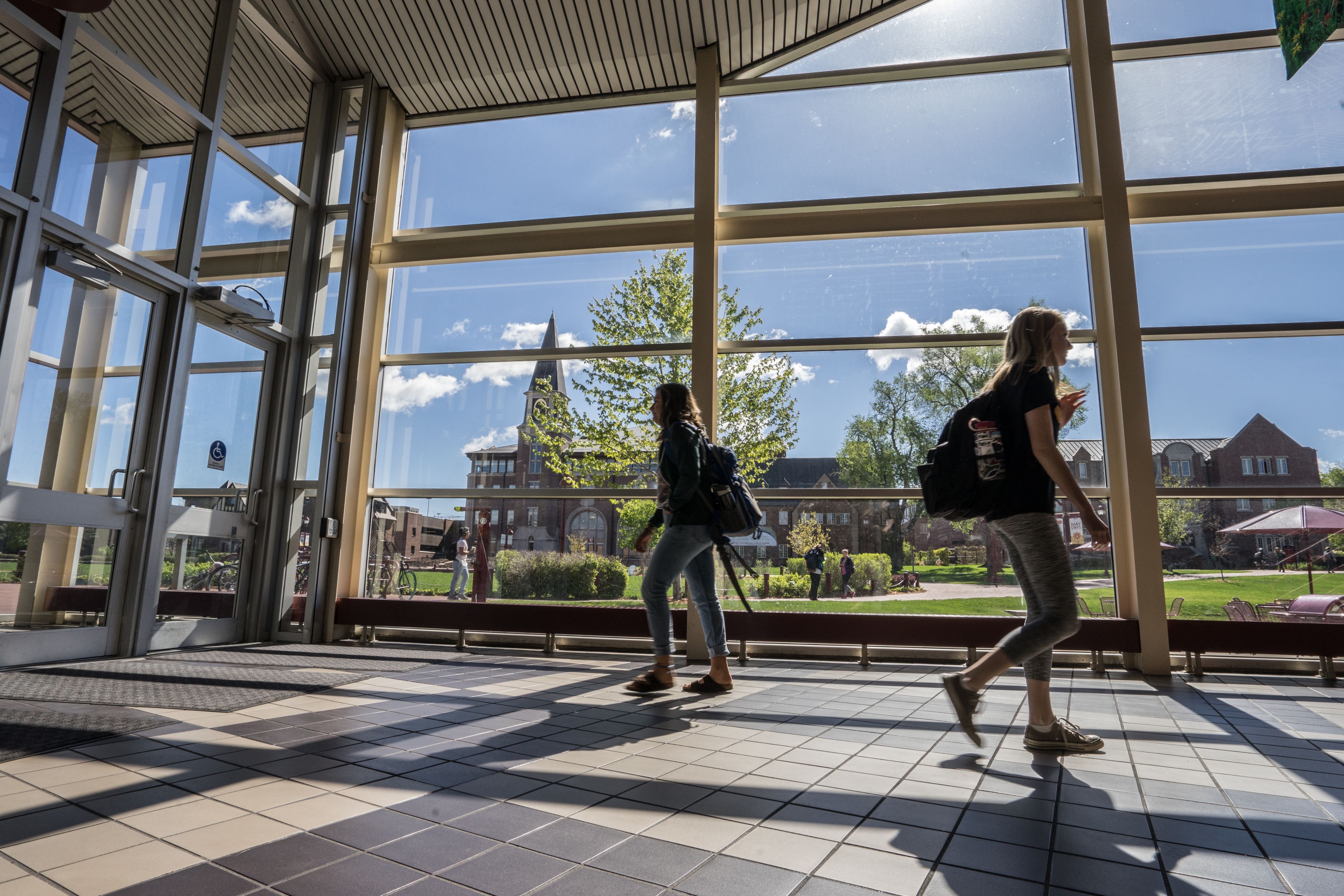 DU students walk across the Bridge